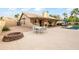 Relaxing patio with fire pit and outdoor seating at 13454 N 88Th Pl, Scottsdale, AZ 85260
