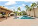 Relaxing pool area with patio furniture and lush landscaping at 13454 N 88Th Pl, Scottsdale, AZ 85260