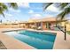 Inviting backyard oasis featuring a sparkling pool and patio at 13454 N 88Th Pl, Scottsdale, AZ 85260