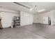 Spacious garage with ample storage shelving at 15041 W Wrigley Way, Surprise, AZ 85374