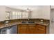 Kitchen with granite countertops and stainless steel appliances at 15041 W Wrigley Way, Surprise, AZ 85374