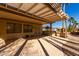 Covered patio with pergola and desert landscaping at 15041 W Wrigley Way, Surprise, AZ 85374