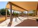 Covered patio with pergola, providing shade and outdoor space at 15041 W Wrigley Way, Surprise, AZ 85374