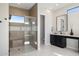 Spa-like bathroom with walk-in shower, built-in bench, and modern fixtures at 15214 N Elena Dr, Fountain Hills, AZ 85268