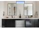 Double vanity with black cabinets and quartz countertop at 15214 N Elena Dr, Fountain Hills, AZ 85268