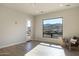 Bright bedroom with large window and mountain views, featuring a comfortable armchair at 15214 N Elena Dr, Fountain Hills, AZ 85268