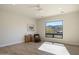 Spacious bedroom with large window, mountain views, and hardwood floors at 15214 N Elena Dr, Fountain Hills, AZ 85268