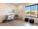 Bright Bedroom with large window, crib, chair, and ample floor space at 15214 N Elena Dr, Fountain Hills, AZ 85268
