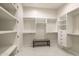 Large walk-in closet with ample shelving and drawers at 15214 N Elena Dr, Fountain Hills, AZ 85268