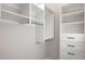 Large walk-in closet with shelving and hanging rods at 15214 N Elena Dr, Fountain Hills, AZ 85268