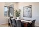 Modern dining room with large art piece and mountain views at 15214 N Elena Dr, Fountain Hills, AZ 85268