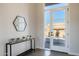 Bright and airy entryway with modern console table and mirror at 15214 N Elena Dr, Fountain Hills, AZ 85268