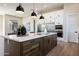 Island kitchen with stainless steel appliances and modern cabinetry at 15214 N Elena Dr, Fountain Hills, AZ 85268