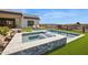 Inviting pool and spa area with decorative tile, adjacent to a well-manicured outdoor living space at 15214 N Elena Dr, Fountain Hills, AZ 85268