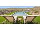 Relaxing view of backyard pool and spa area with lounge chairs and desert scenery at 15214 N Elena Dr, Fountain Hills, AZ 85268