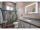 Bathroom with walk-in shower, toilet and granite countertop at 15848 E Palomino Blvd, Fountain Hills, AZ 85268