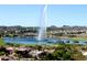 Aerial view of community with lake and fountain at 15848 E Palomino Blvd, Fountain Hills, AZ 85268