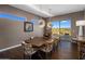 Elegant dining room with a rustic wooden table and stunning mountain views at 15848 E Palomino Blvd, Fountain Hills, AZ 85268