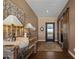 Inviting entryway with rustic wooden accents and a view to the outdoors at 15848 E Palomino Blvd, Fountain Hills, AZ 85268