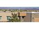 View of home's exterior showcasing stone, neutral colors, and mountain backdrop at 15848 E Palomino Blvd, Fountain Hills, AZ 85268