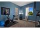 Well-equipped home gym with exercise bike and floor mats at 15848 E Palomino Blvd, Fountain Hills, AZ 85268
