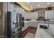 Modern kitchen with stainless steel appliances and ample cabinet space at 15848 E Palomino Blvd, Fountain Hills, AZ 85268
