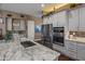 Modern kitchen features stainless steel appliances and granite countertops at 15848 E Palomino Blvd, Fountain Hills, AZ 85268