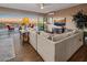 Spacious living room with stunning sunset views and access to a deck at 15848 E Palomino Blvd, Fountain Hills, AZ 85268