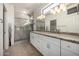 Elegant bathroom with double vanity and large shower at 16336 W Salado Creek Dr, Surprise, AZ 85387