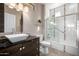 Clean bathroom with a tub, shower, and modern vanity at 16336 W Salado Creek Dr, Surprise, AZ 85387