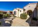 Beautiful home with a welcoming front porch and nicely manicured landscaping at 16336 W Salado Creek Dr, Surprise, AZ 85387