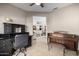 Home office with view into living room at 16336 W Salado Creek Dr, Surprise, AZ 85387