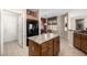 Bright kitchen with breakfast bar and pantry at 16336 W Salado Creek Dr, Surprise, AZ 85387
