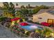 Luxury home with pool, landscaped yard, and two-car garage at 18059 W Tierra Del Sol Dr, Surprise, AZ 85387