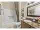 Simple bathroom with shower/tub combo and granite vanity at 18059 W Tierra Del Sol Dr, Surprise, AZ 85387