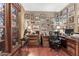 Bright home office featuring hardwood floors and wall-to-wall photos at 18059 W Tierra Del Sol Dr, Surprise, AZ 85387