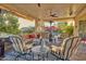 Relaxing covered patio with comfortable seating and views of the pool at 18059 W Tierra Del Sol Dr, Surprise, AZ 85387