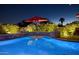 Inviting pool with a relaxing patio and lighting at 18059 W Tierra Del Sol Dr, Surprise, AZ 85387