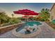 Enjoy this refreshing kidney-shaped pool with a swim-up bar at 18059 W Tierra Del Sol Dr, Surprise, AZ 85387