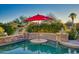 Pool with swim up bar and tranquil water features at 18059 W Tierra Del Sol Dr, Surprise, AZ 85387