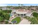Beautiful home with a private backyard oasis, including a pool, outdoor kitchen, and lush landscaping at 321 N Portland Ave, Gilbert, AZ 85234