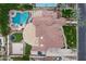 A large property with a pool, basketball court, and well-maintained landscaping at 321 N Portland Ave, Gilbert, AZ 85234