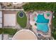An aerial view of a backyard, featuring a custom pool and sport court at 321 N Portland Ave, Gilbert, AZ 85234