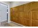 Hallway with floor to ceiling cabinets for maximum storage at 321 N Portland Ave, Gilbert, AZ 85234