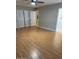Large bedroom with double door closet and wood-look floors at 3655 N 5Th Ave # 106, Phoenix, AZ 85013