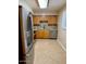 Updated kitchen with stainless steel appliances and wood cabinets at 3655 N 5Th Ave # 106, Phoenix, AZ 85013
