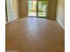 Living room with tile floors and access to patio at 3655 N 5Th Ave # 106, Phoenix, AZ 85013