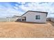 This backyard is fully enclosed with block fencing, offering privacy and a blank canvas for outdoor living at 4312 E Bradford Ave, San Tan Valley, AZ 85143
