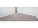 A bright bedroom features neutral carpeting and is freshly painted in a neutral color at 4312 E Bradford Ave, San Tan Valley, AZ 85143