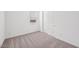 A bright bedroom features neutral carpeting, a window, and a sliding door closet at 4312 E Bradford Ave, San Tan Valley, AZ 85143